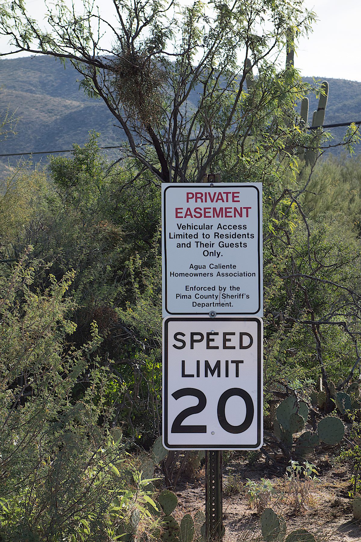 The Avenida de Suzenu Trailhead does not have any signage with the name of the trailhead - this Private Easement sign is one of the few details that hints that this is a well known parking area/trailhead. December 2014.