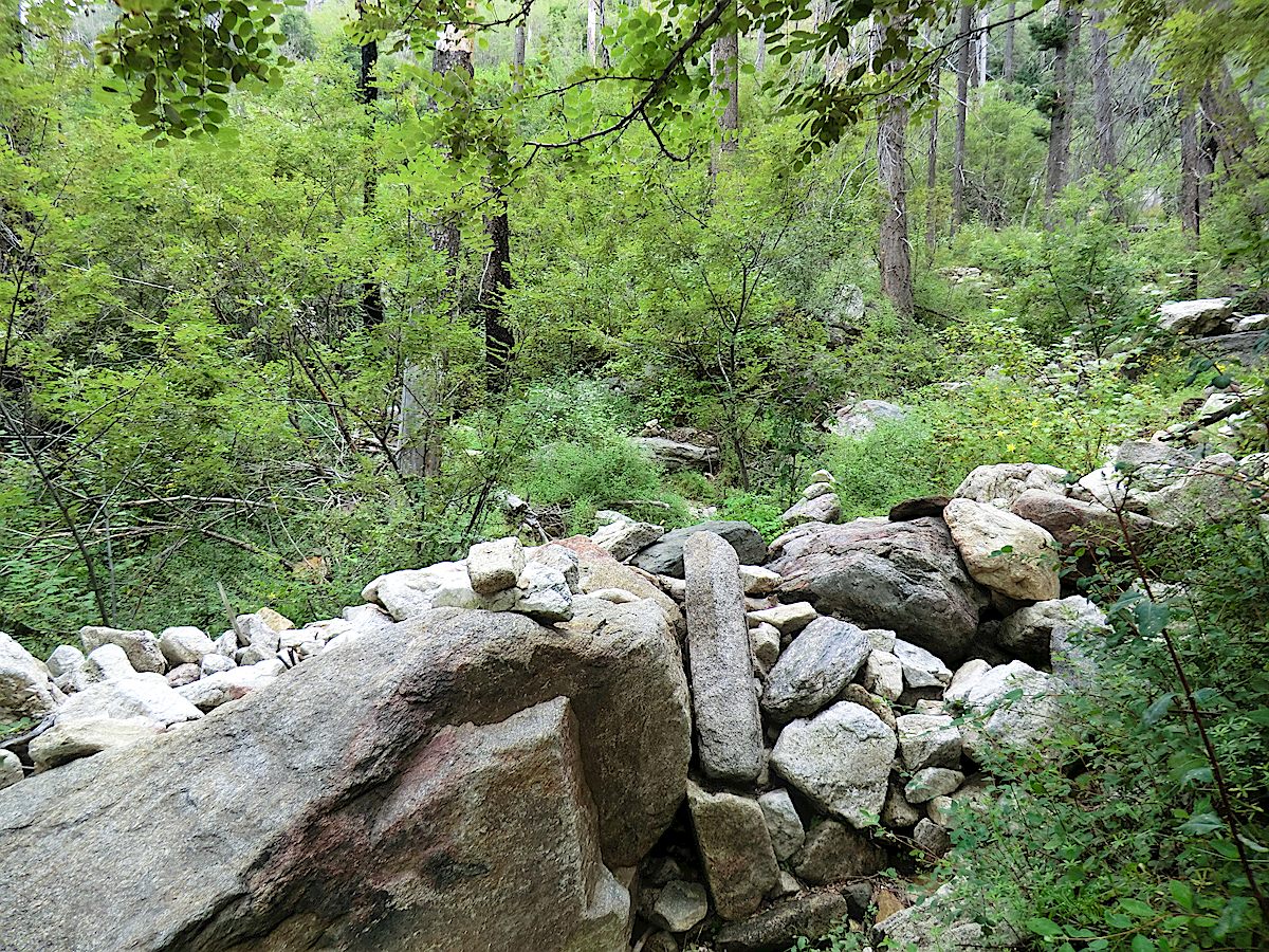 The rocky drainage - the trail crosses this drainage before the cabin site. September 2013.