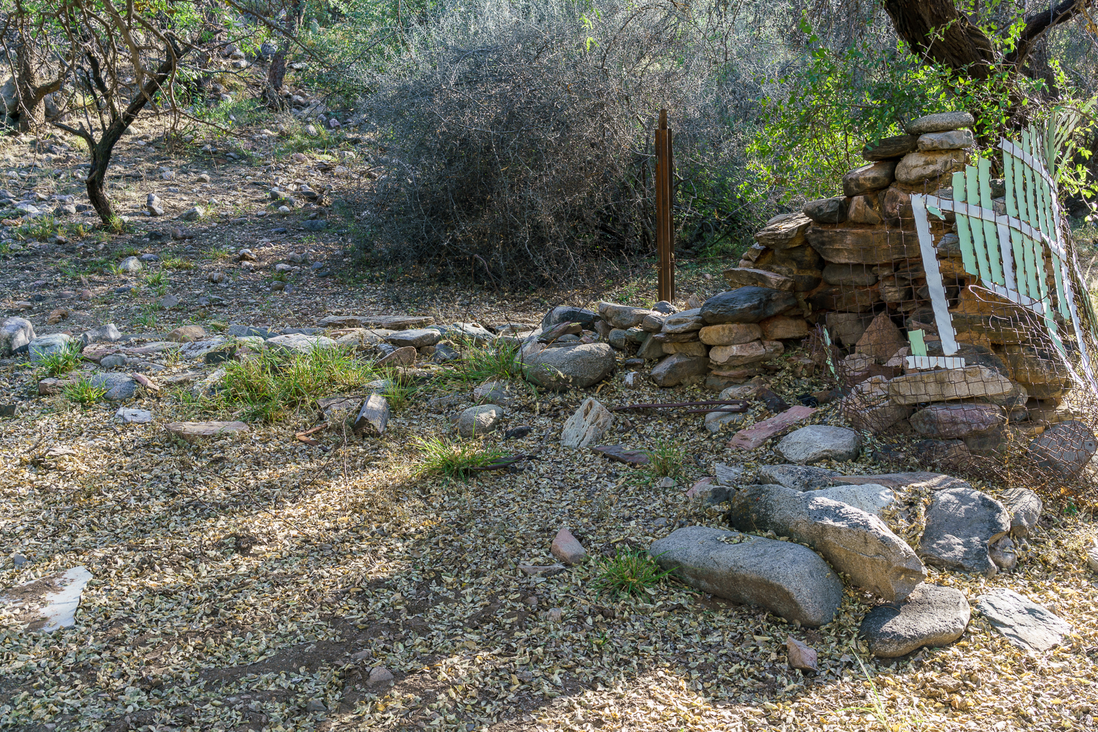 An old fireplace and fence near Alder Canyon. October 2016.
