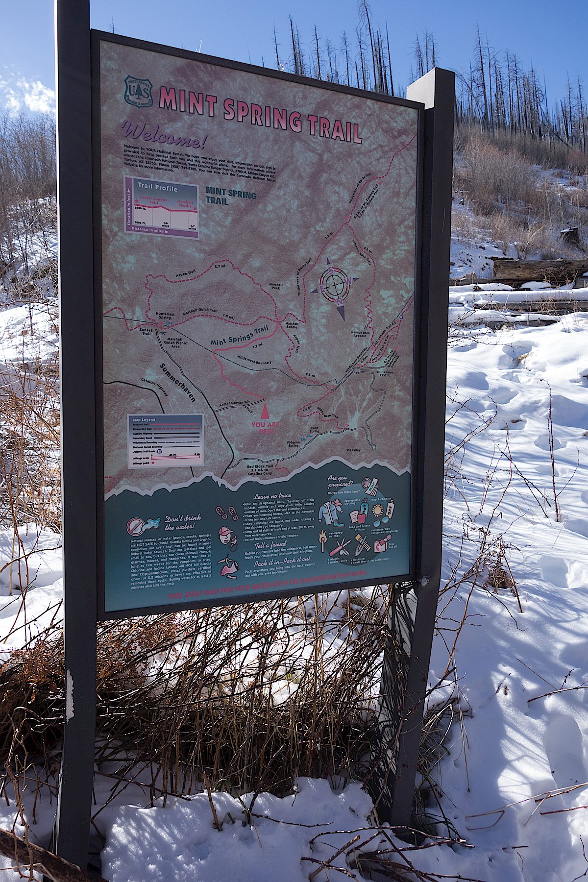 Small trail sign near the start of the trail. April 2014.