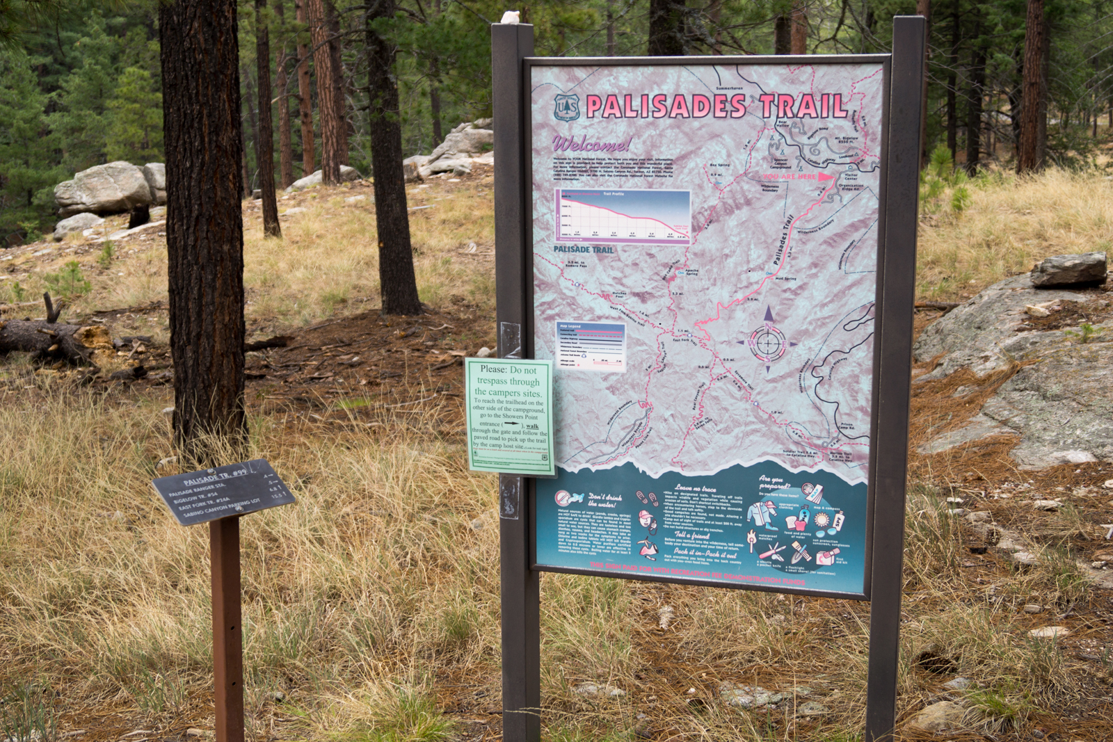 Trail Map Sign and trail sign at the Palisade Trailhead. July 2014.