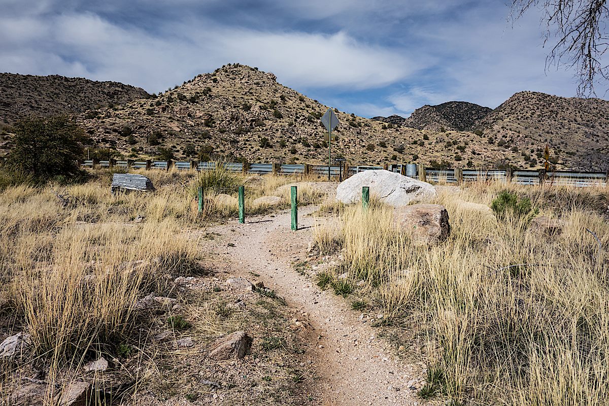 About to cross the General Hitchcock Highway on the Bug Spring Trail connector to the Gordon Hirabayashi Recreation Site. March 2014