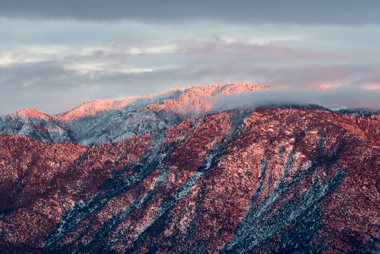 Snow and clouds on the top of the mountain. January 2016.