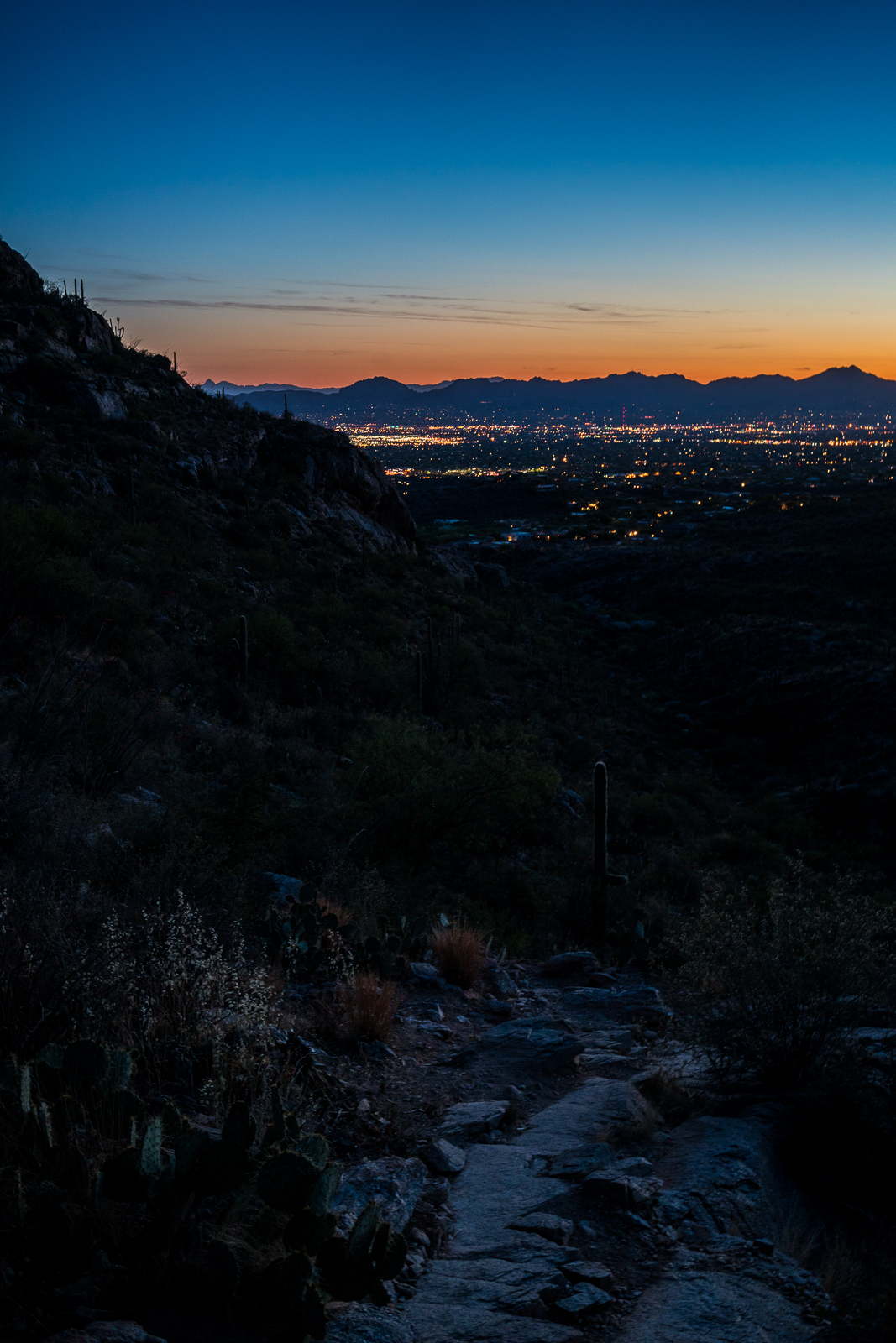 Loosing the light while descending the Pontatoc Ridge Trail - Tucson city lights in background. April 2016.
