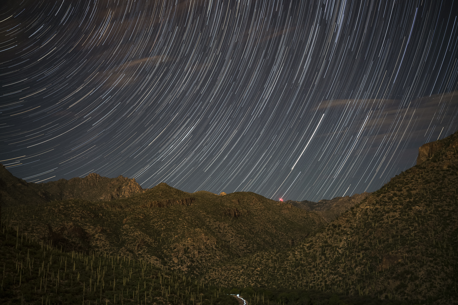 Star trails and the lights from Mount Bigelow - looking up Sabino Canyon from the Stone Water Tank. September 2016.