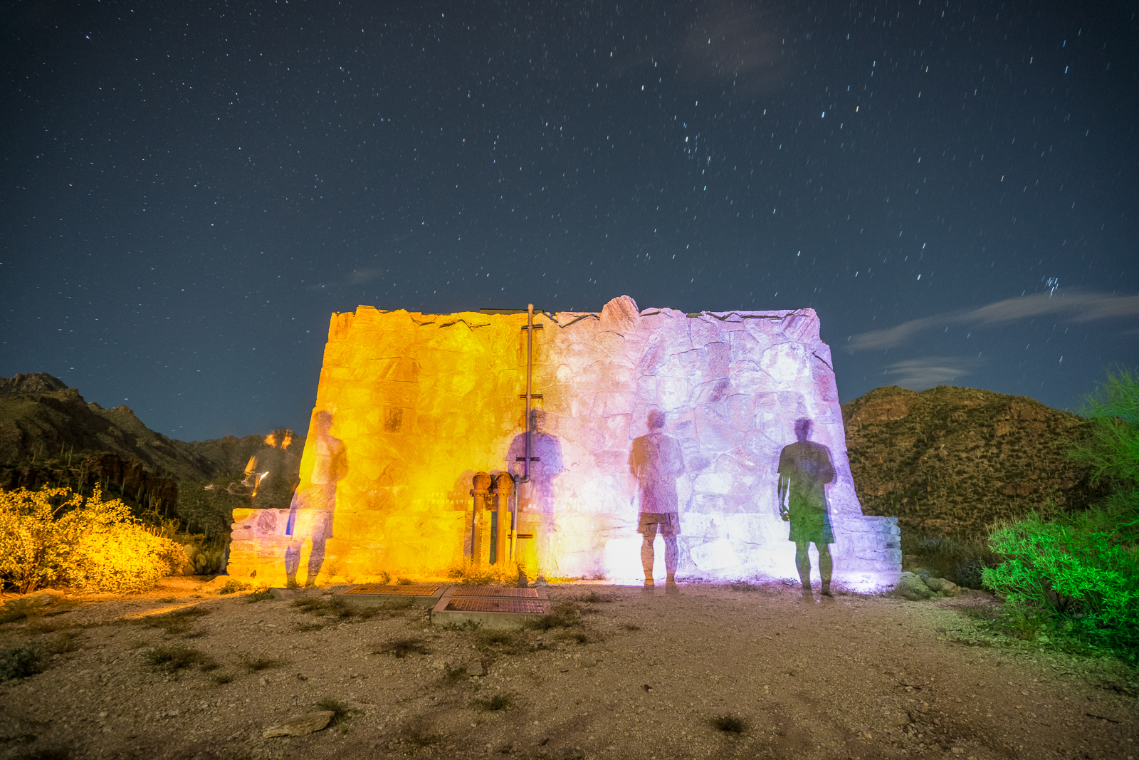 Painting the stone water tank above Sabino Canyon with light. September 2016.